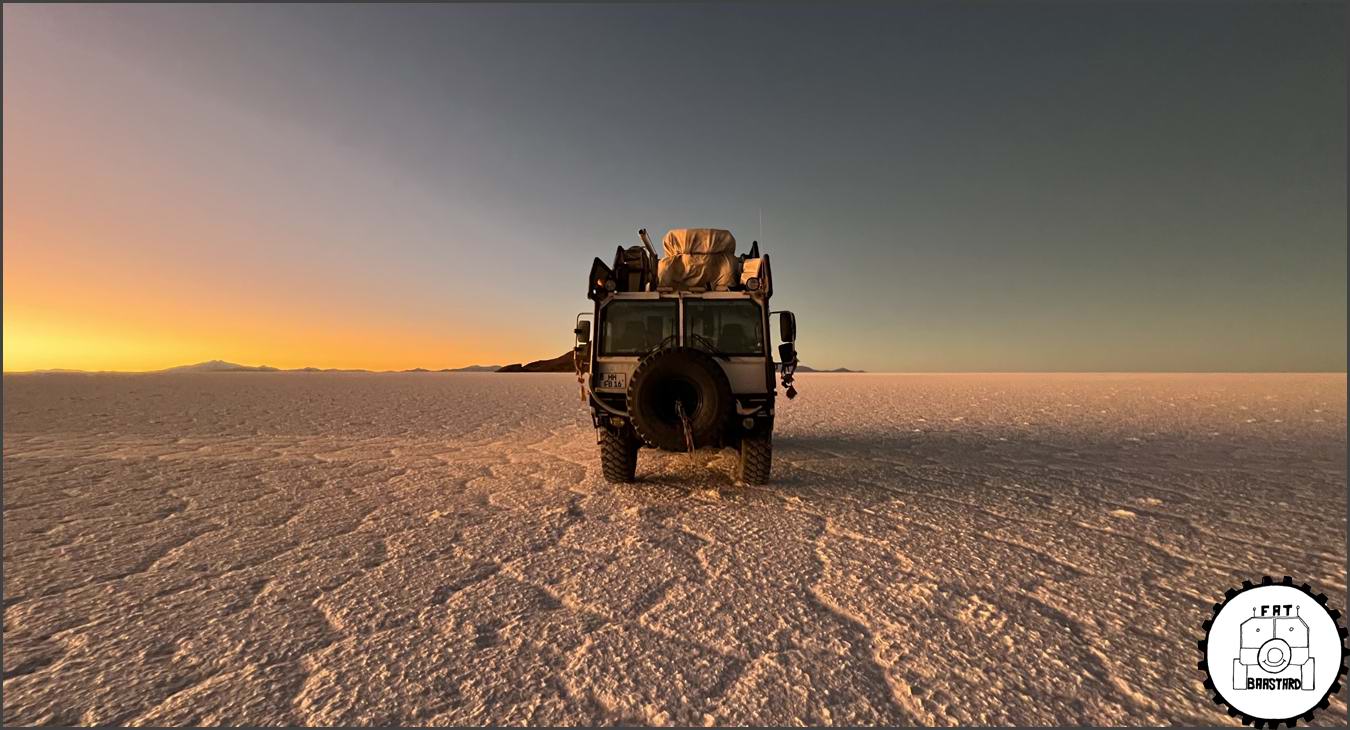 MAN KAT1 6x6 expedition truck parked on salt flats during overland journey