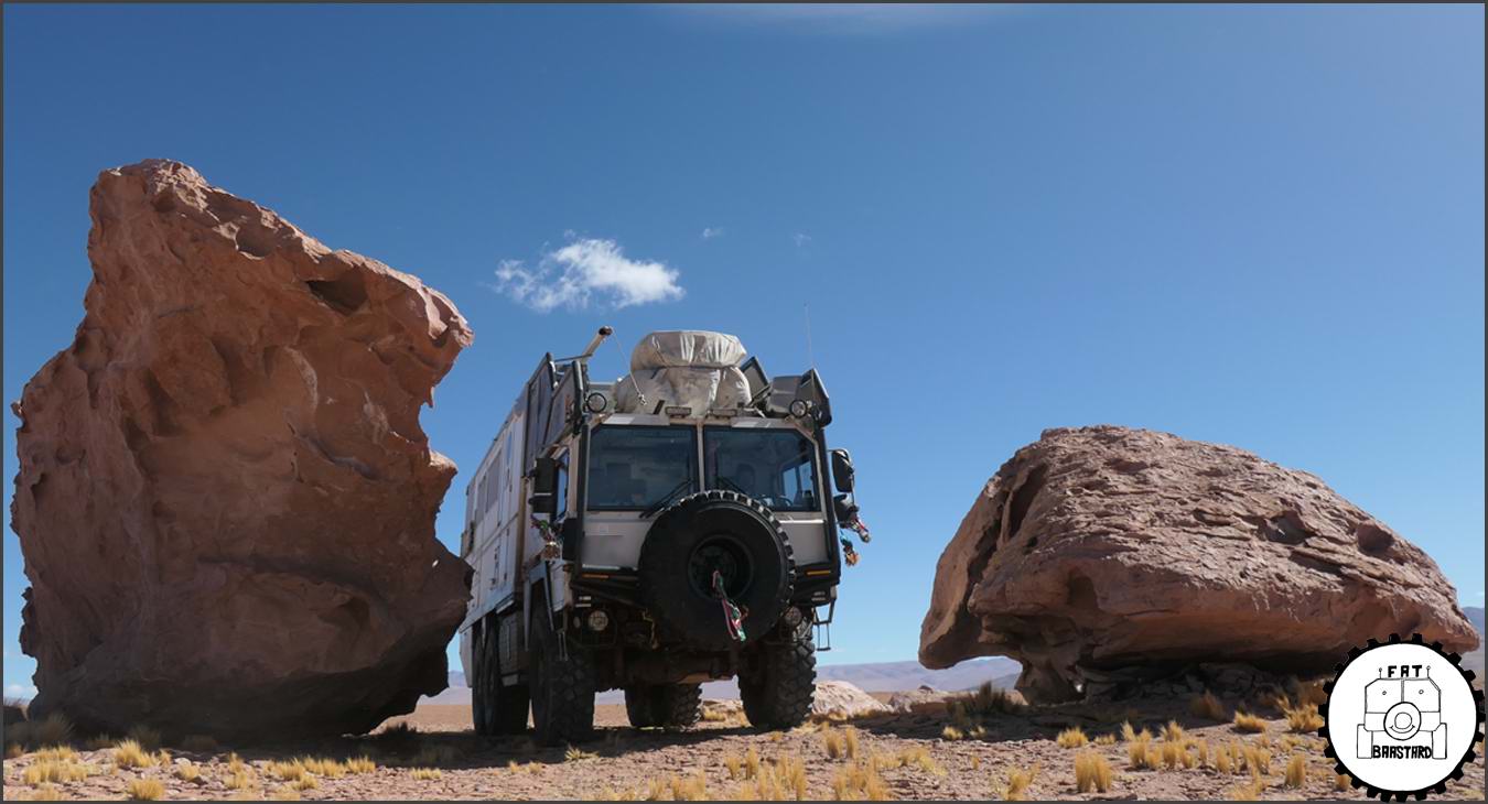 MAN KAT1 6x6 expedition truck for sale driving through desert landscape