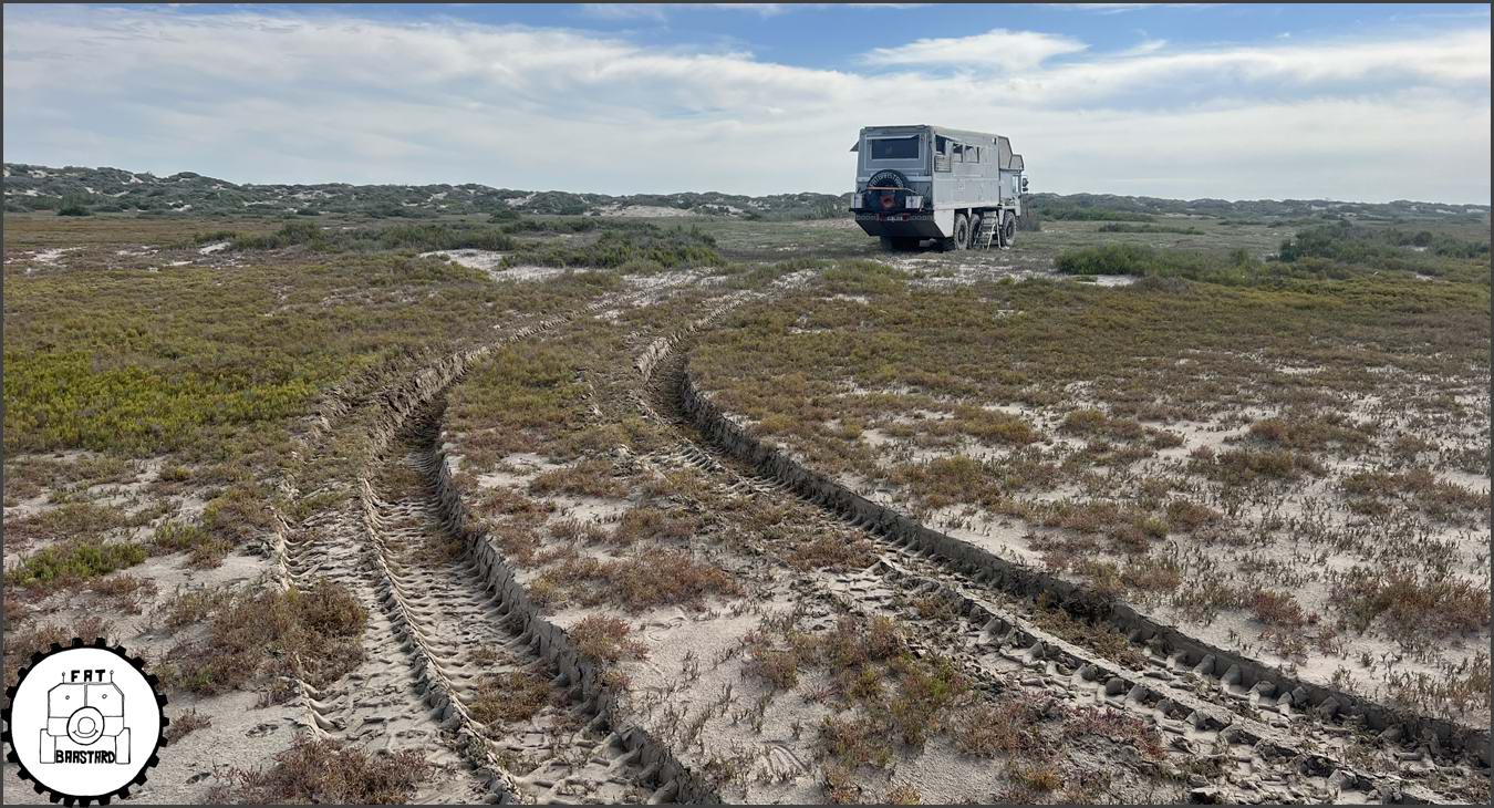 MAN KAT1 6x6 expedition truck parked in remote wilderness landscape