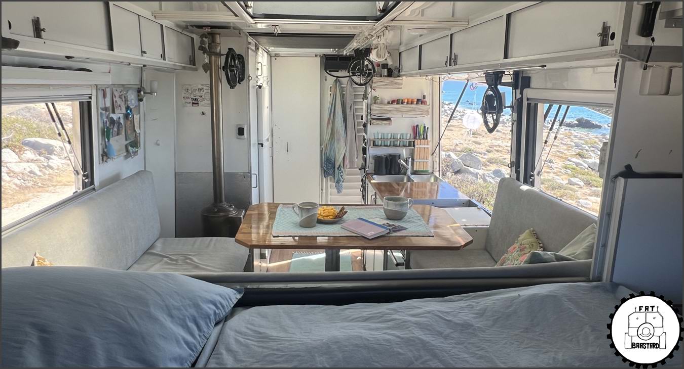 Interior view of expedition truck living unit and seating area