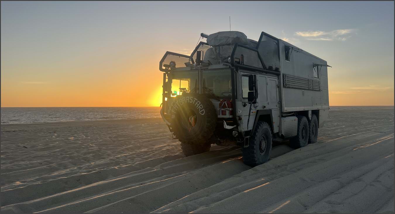 MAN KAT 1 6x6 Expedition Truck on the beach again with sunset
