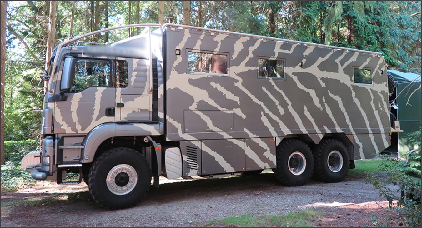 MAN TGS 26.440 6x6 Expeditionsfarzeug im Wald